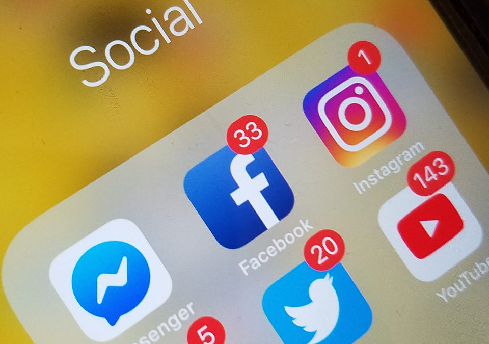 Social media app icons on an iPhone